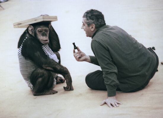 Animal tamer Stepan Isaakyan with Ricky the monkey