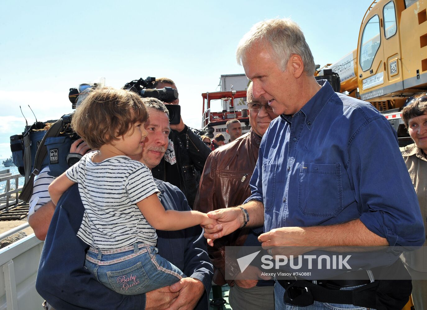 James Cameron and Yevgeny Chernyaev with his daughter