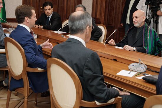 Russian President Medvedev meets Hamid Karzai