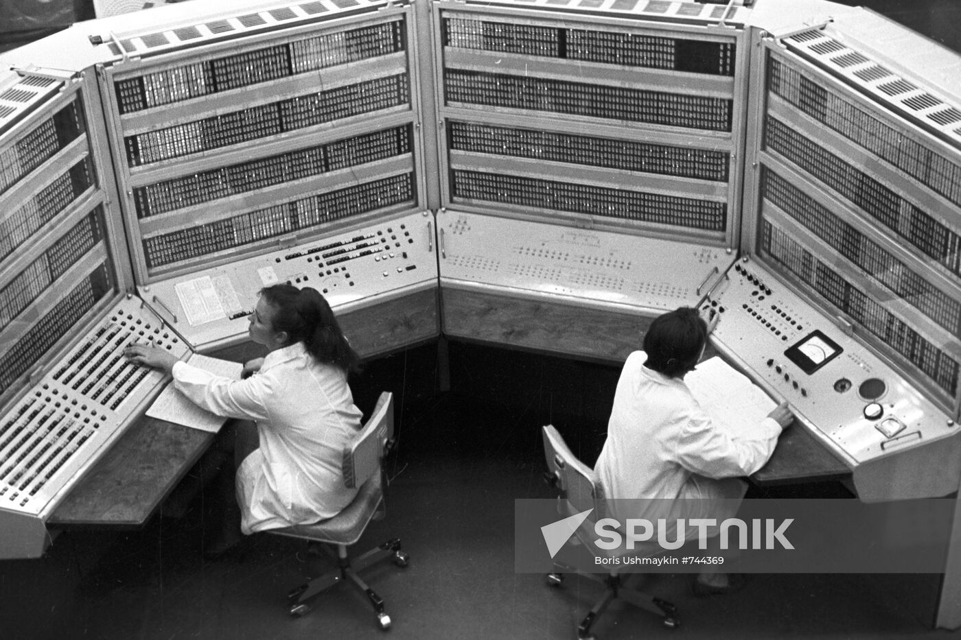 Operators of "BESM-6" computer system at control panel