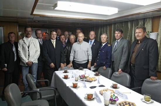 Vladimir Putin visiting Mikhail Stanitsyn large freezer trawler