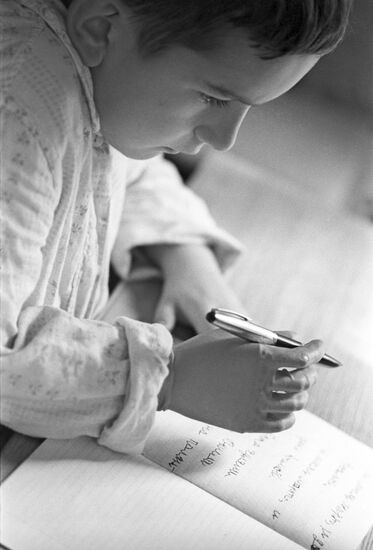 Boy with bioelectric prosthetic hand