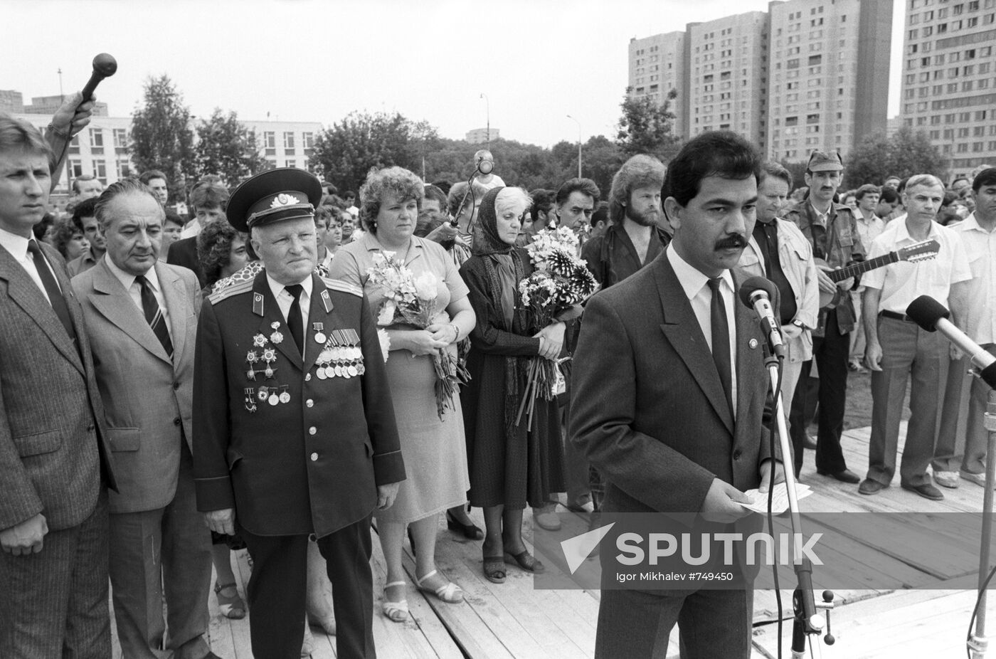 People attending a ceremony at the Afghanistan war monument