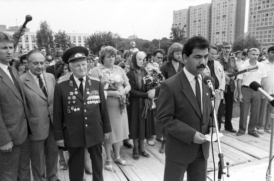 People attending a ceremony at the Afghanistan war monument