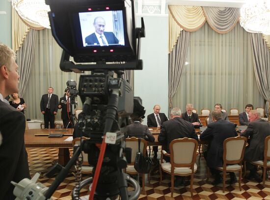 Vladimir Putin meets Martin Winterkorn