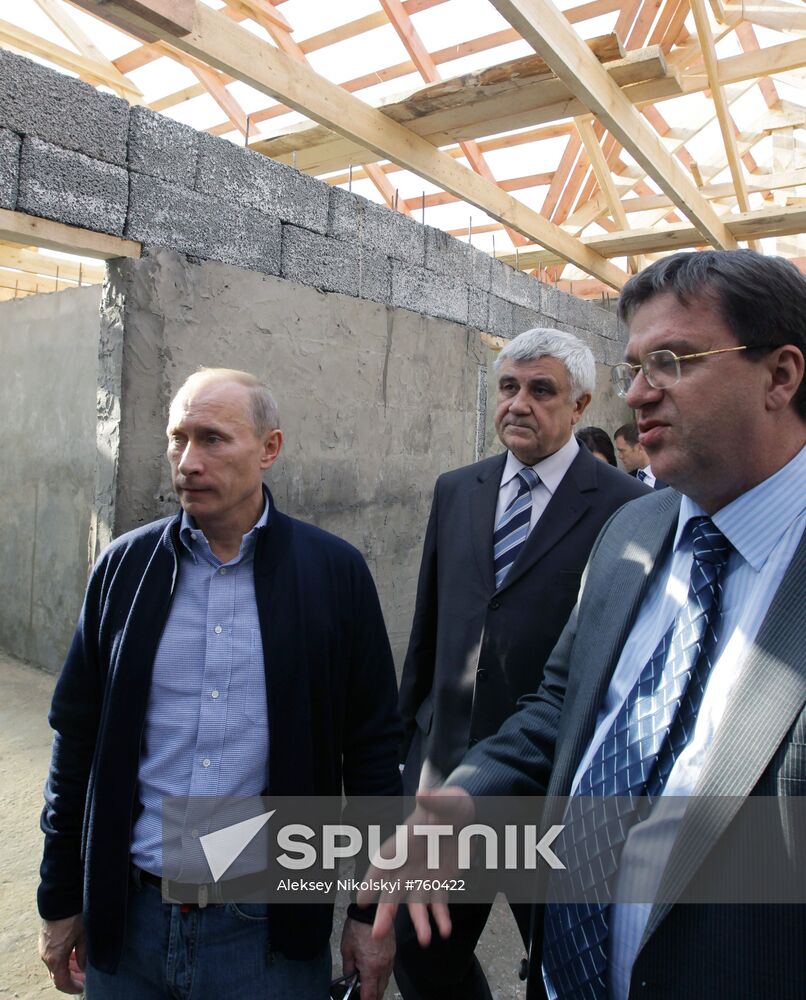 September 15, 2010. Russian Prime Minister Vladimir Putin (left) visiting Ivatino village (Melenkov district). Having inspected the course of construction of houses for those affected by the wildfires. Vladimir Region Governor Vladimir Vinogradov (background). Location: Russia, Vladimir Region. Author: Aleksey Nikolskyi/Sputnik. Russian Prime Minister Vladimir Putin visits Ivatino village