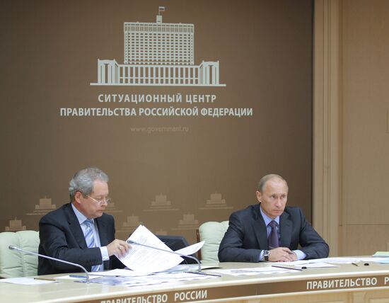 Vladimir Putin conducts a teleconference