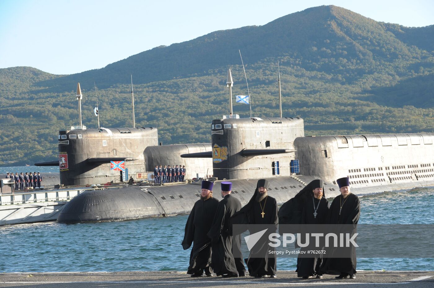 Clergymen on the pier of the 16th submarine squadron