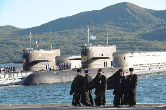 Clergymen on the pier of the 16th submarine squadron