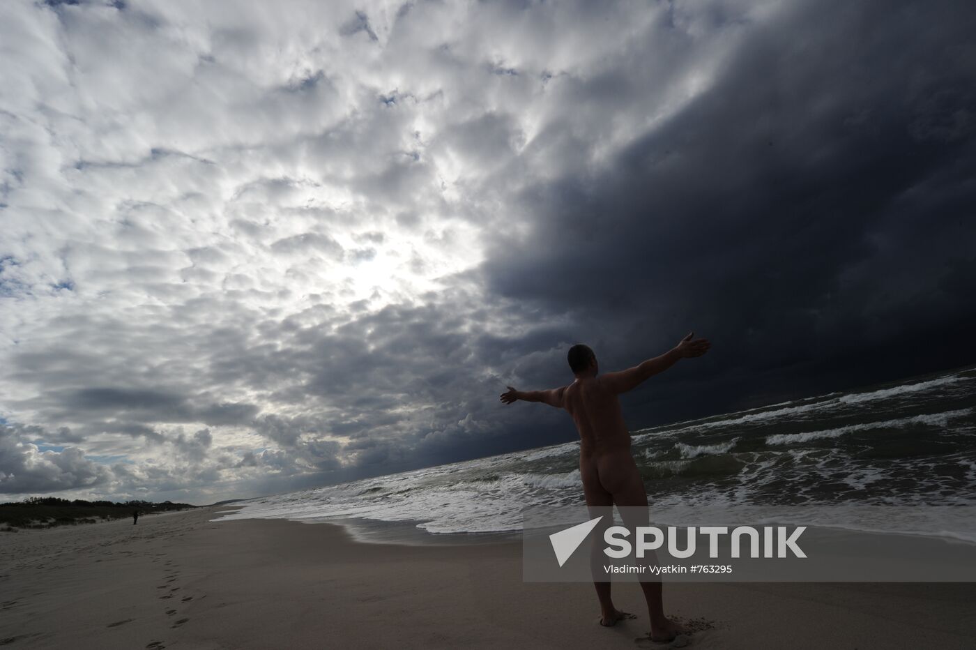 Man at Baltic Sea shore