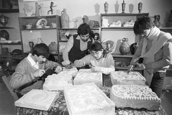 Future stone carvers at hands-on course