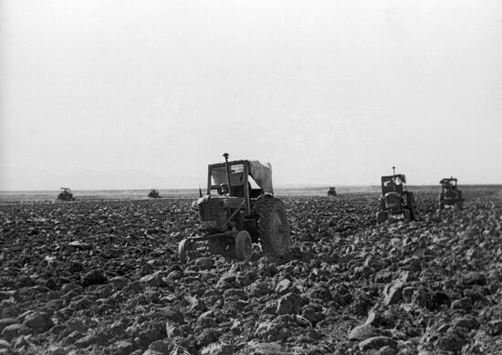 Tractors at fields of Korean Democratic People's Republic