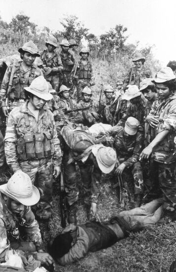 Medical aid to wounded soldier