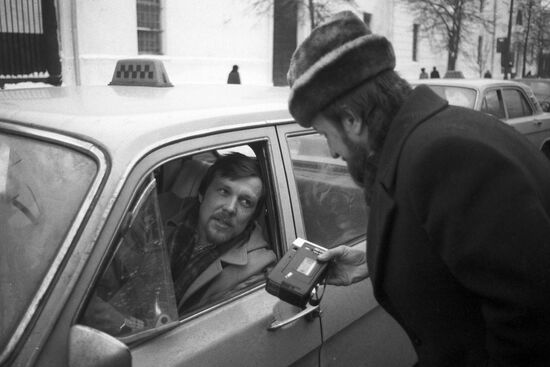 Soviet people questioned in the streets