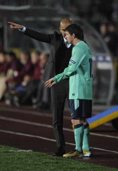 Josep Guardiola and Lionel Messi