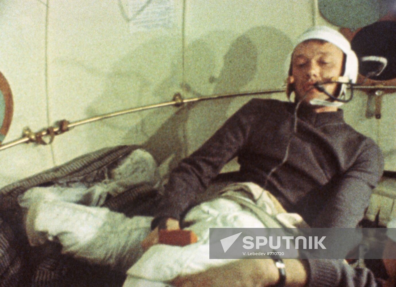 Alexei Yeliseev taking his spacesuit on before spacewalk
