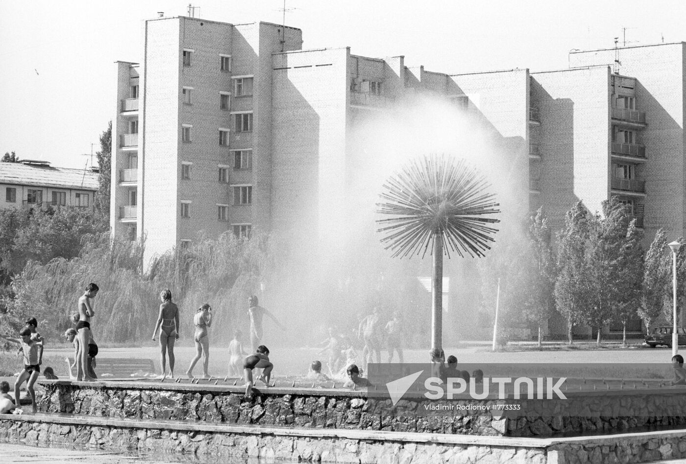 Children bathing in a fountain