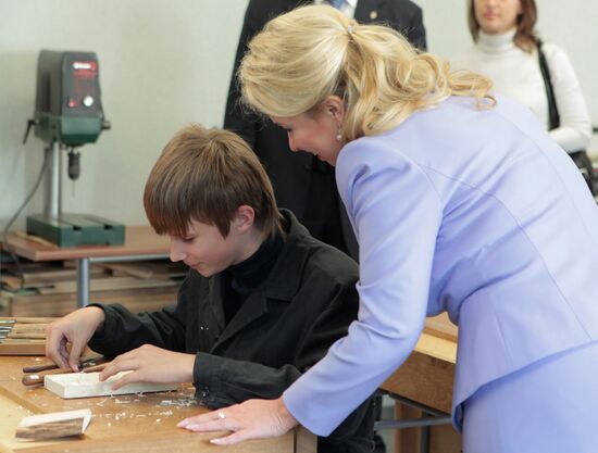 Russia's first lady Svetlana Medvedeva visits her old school