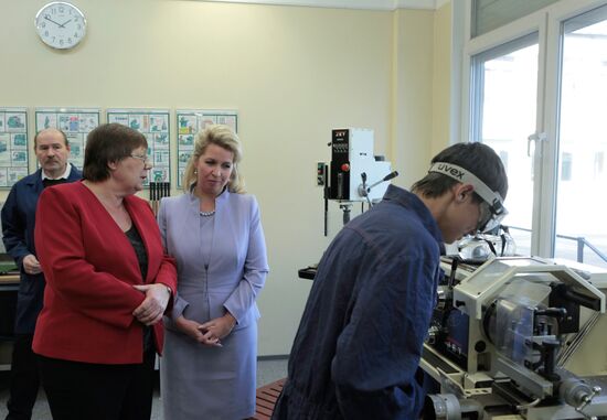 Russia's first lady Svetlana Medvedeva visits her old school