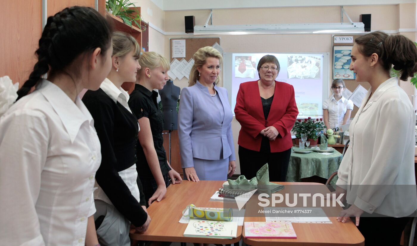 Russia's first lady Svetlana Medvedeva visits her old school