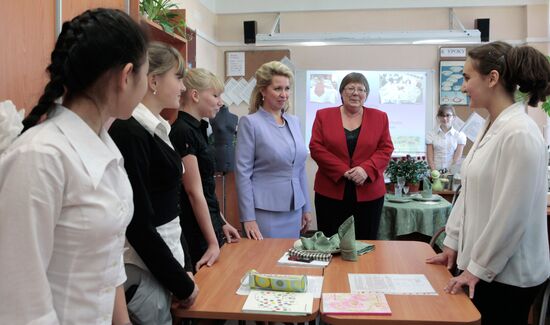 Russia's first lady Svetlana Medvedeva visits her old school