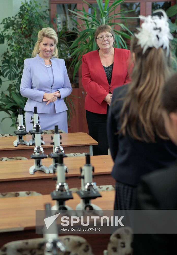 Russia's first lady Svetlana Medvedeva visits her old school