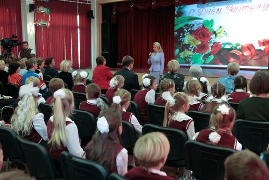 Russia's first lady Svetlana Medvedeva visits her old school