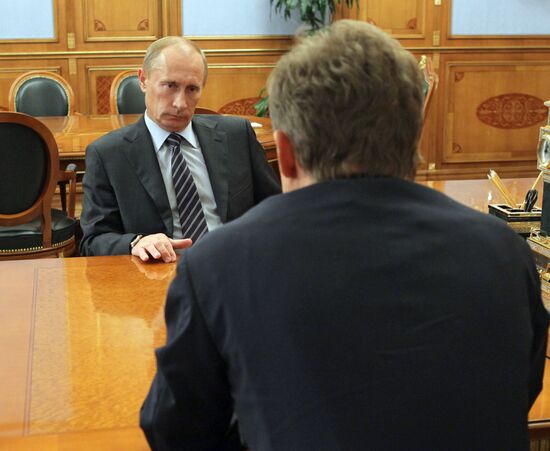 Vladimir Putin meets with Alexei Miller