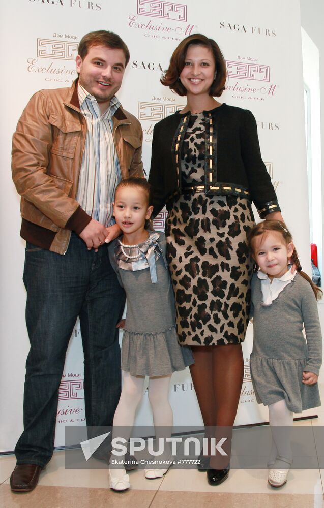 Yana Batyrshina with her husband and daughter