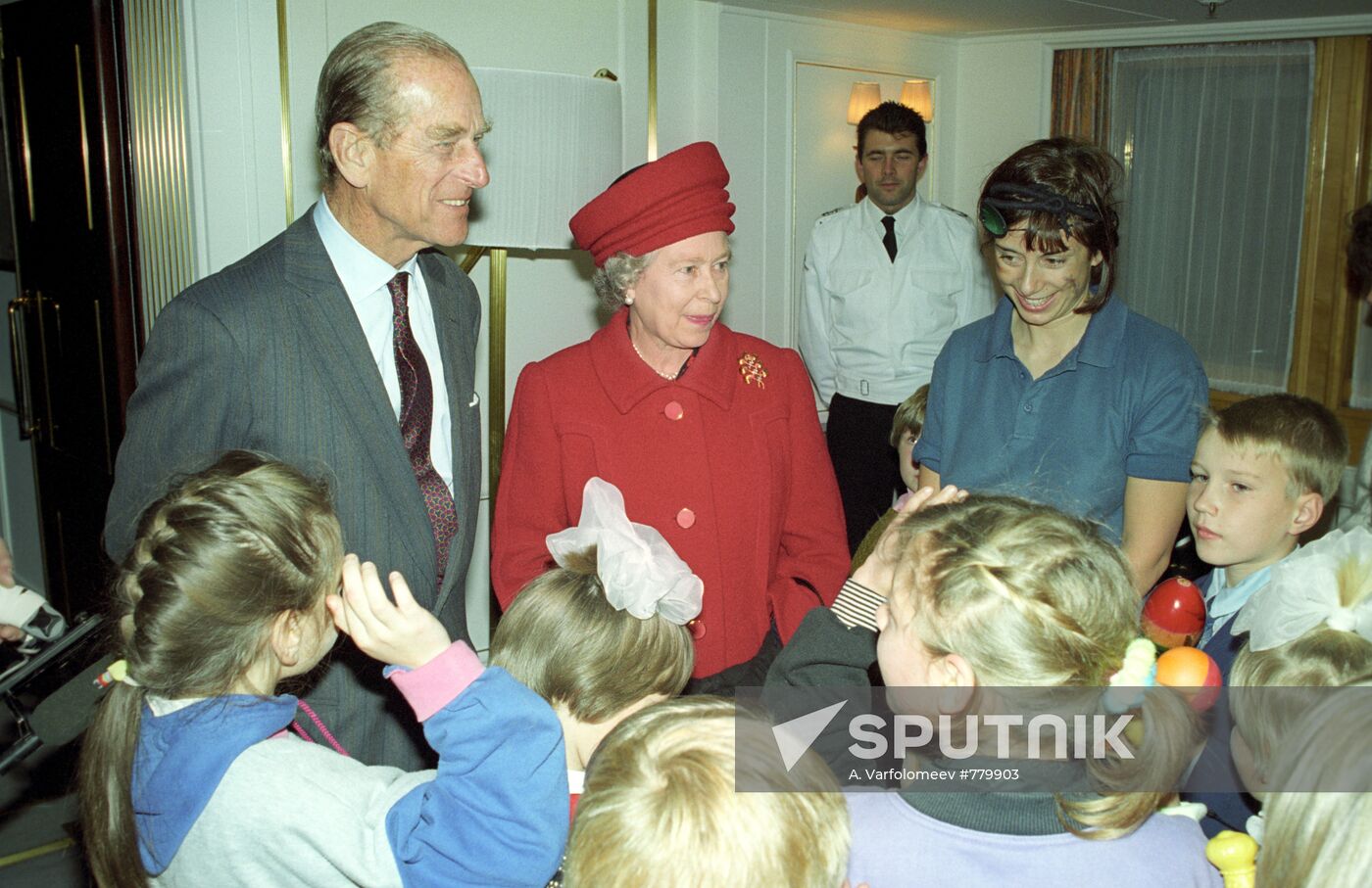 Elizabeth II and Prince Philip with children of orphan asylum