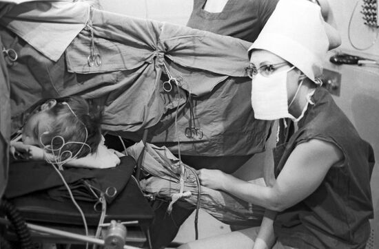 Anesthesiologist Marina Vyzhigina monitoring anesthesia infusion