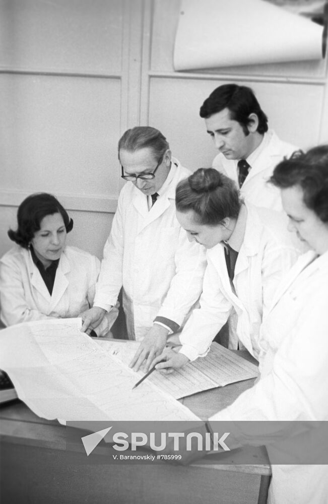Epidemiologists and microbiologists