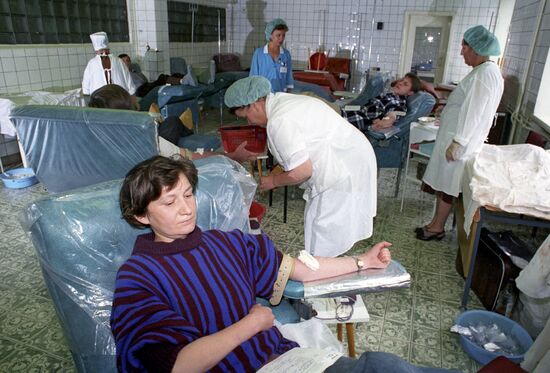 Woman donating blood