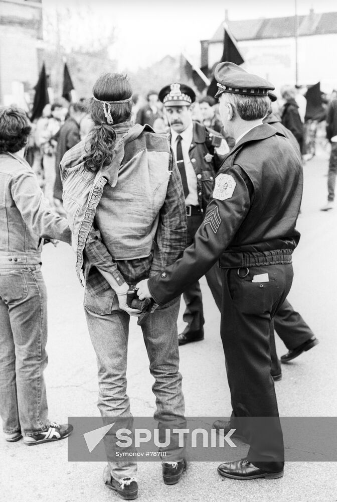 Police arresting May Day demonstrator