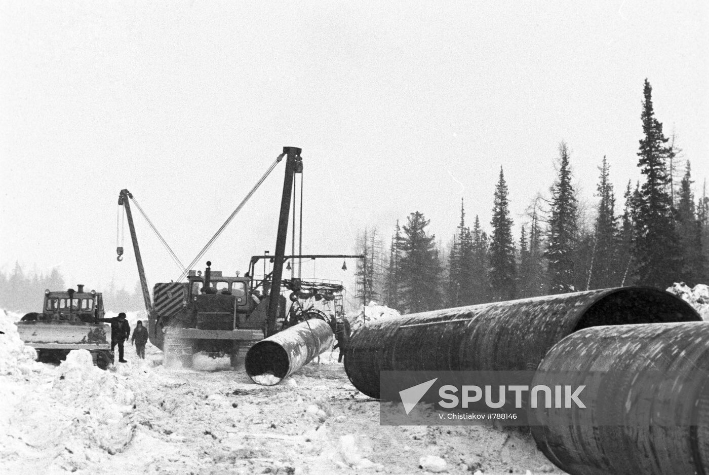 Laying pipes at one of construction sections