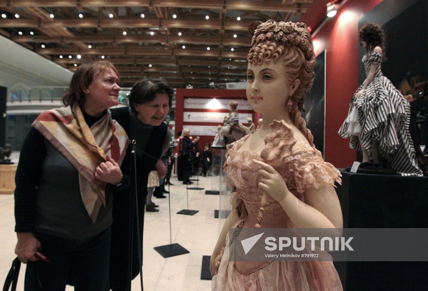 Visitors to Art of Doll exhibition