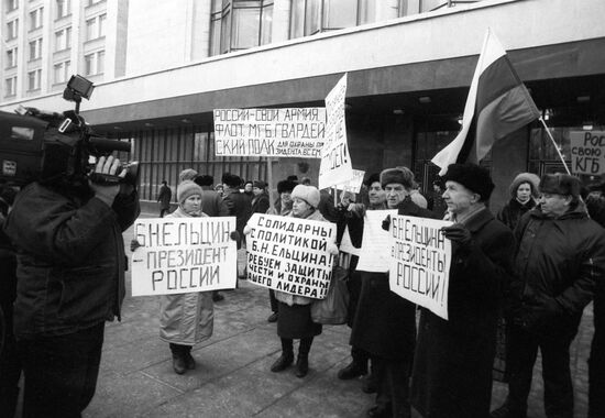 Protesters carrying placards