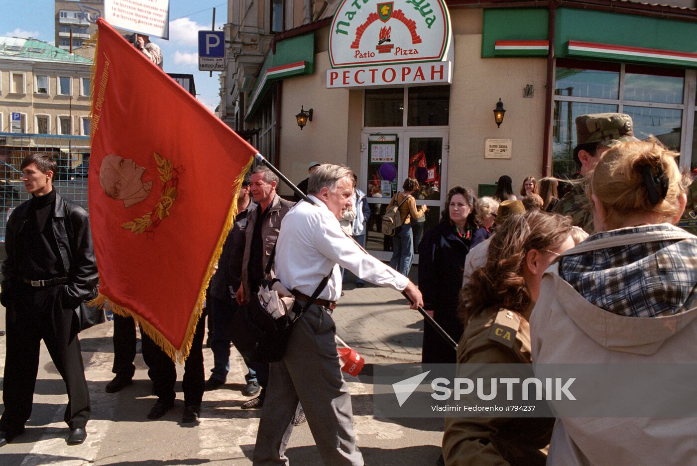 Participant in demonstration of Communist Party