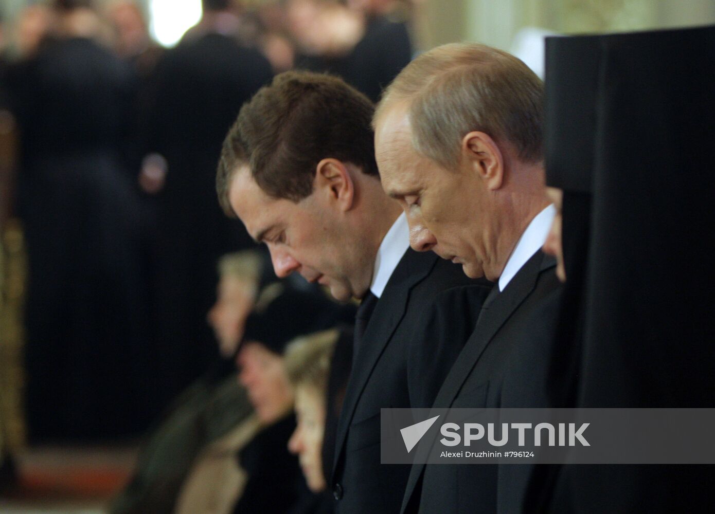 Dmitry Medvedev and Vladimir Putin attend funeral service