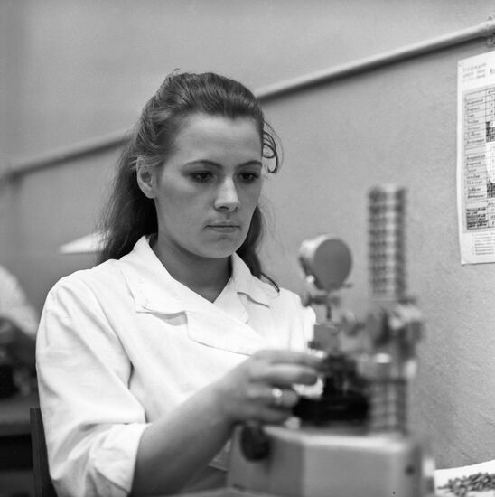 Worker. Kalibr Instrument Plant.