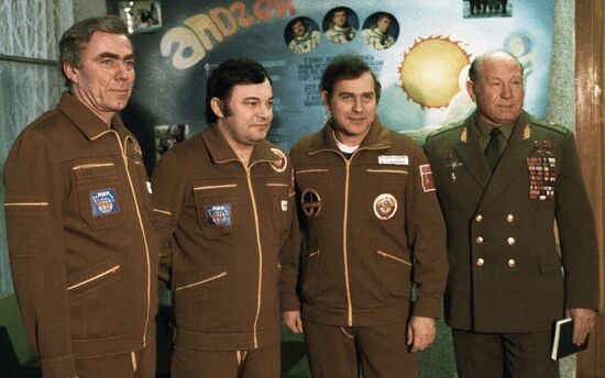 Deputy director of the Yuri Gagarin Cosmonaut Training Centre Leonov meeting space pilots Levchenko, Romanenko and Alexandrov