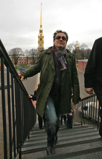 Oleg Menshikov fires a cannon at Peter and Paul Fortress