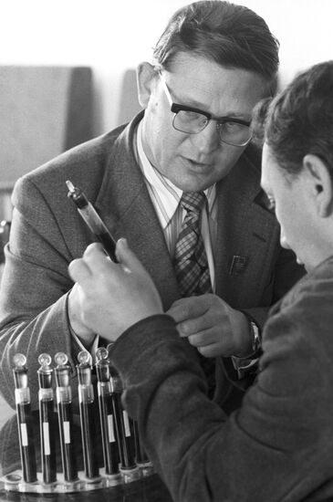 O.Gusev examining oil samples