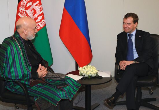 Dmitry Medvedev and Hamid Karzai