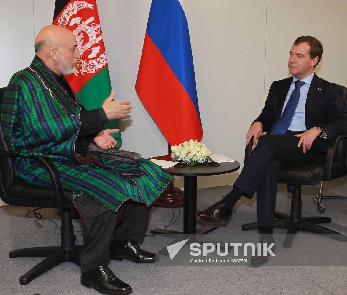 Dmitry Medvedev and Hamid Karzai
