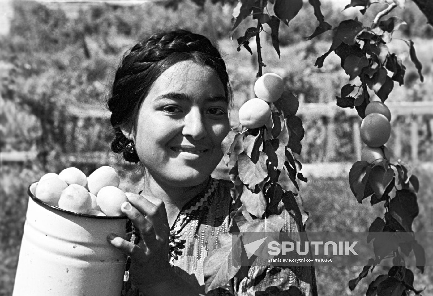 Girl with apricots