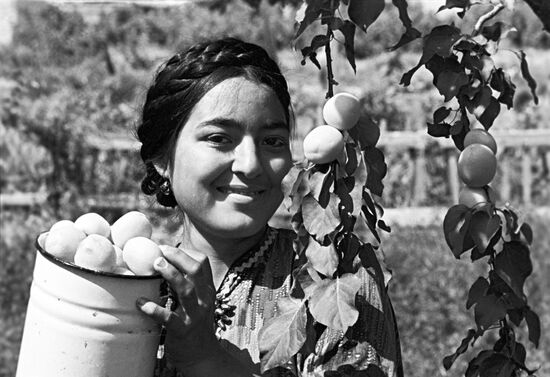 Girl with apricots