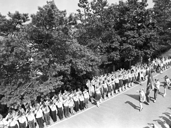 School students lining up at a Young Pioneer camp