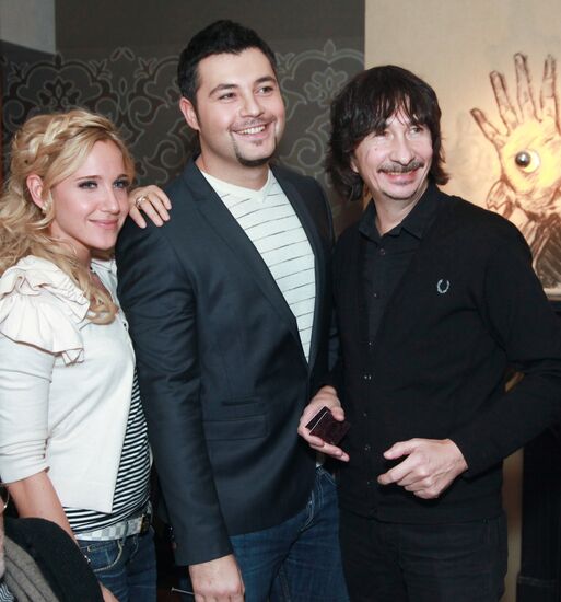 Yulia Kovalchuk, Alexei Chumakov, and Baigali Serkebayev