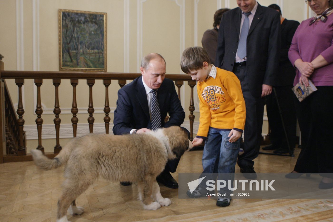 Putin meets boy who invented name for his new dog